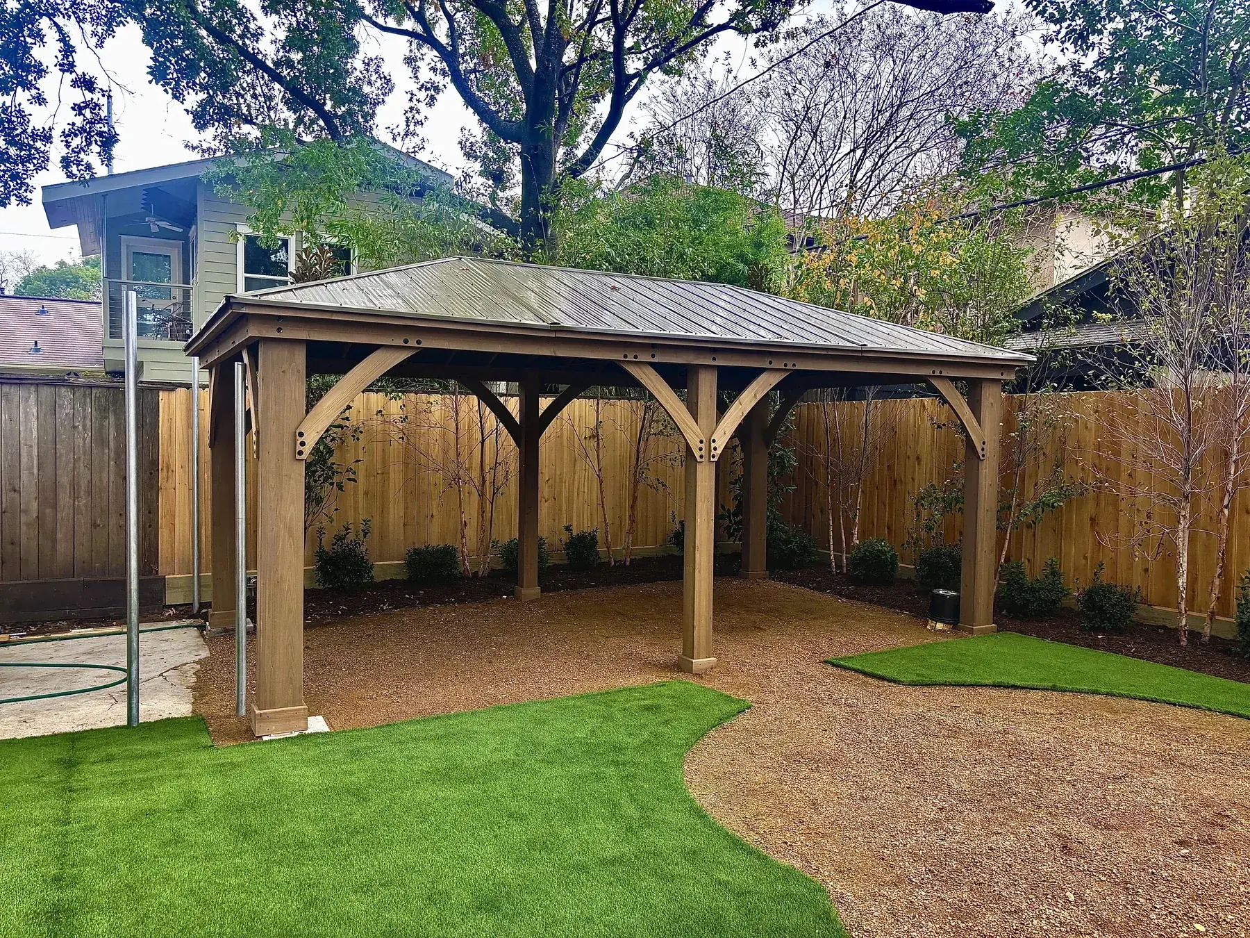 Outdoor pavilion — Timber framing and a covered outdoor gathering space.